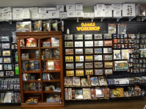 A wall of miniatures and wargames rules in Little Shop of Magic in Las Vegas.