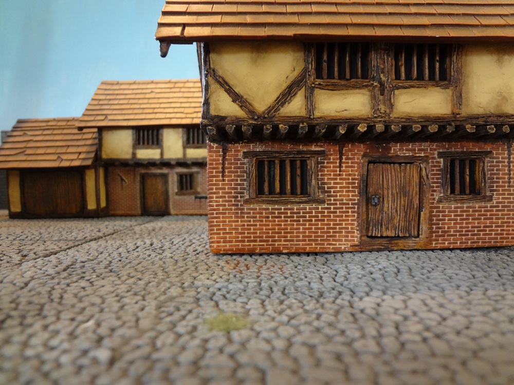 Closeup of the Crystal Caste Farmhouse Cottage for 25-28mm miniatures.