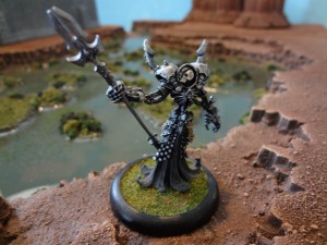 Undead miniature Lich poses in front of Terranscapes swamp