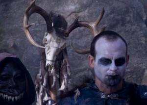 Actor Trevor Hayes with skull makeup as a shaman in the Wild Hunt