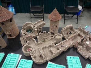Hirst Arts tan Fieldstone Dungeon and Tower with Conical Roof for 25-28mm miniatures at Gen Con booth