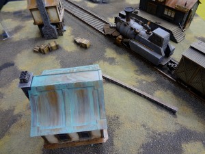 28mm train on tracks on beautiful table layout from Privateer Press at Gen Con