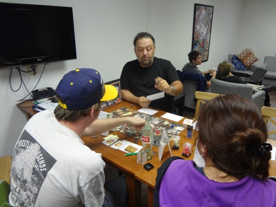 Savage Worlds GM Jerrod Gunning explains a game concept to Scooby-Doo players at Vegas Game Day.