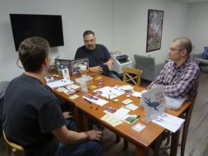 Two PCs and GM for Savage Worlds playing role-playing game at Vegas Game Day