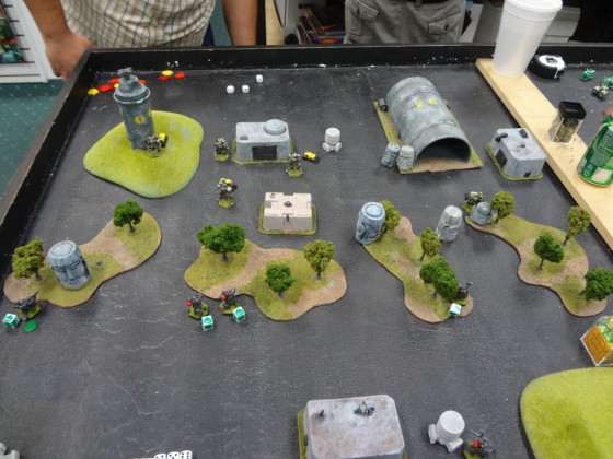Overhead view of miniature battle with Heavy Gear Blitz Southern miniatures
