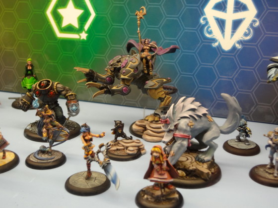 Anime-influenced miniatures for the Relic Knights game with power familiars on display at the 2012 Gen Con