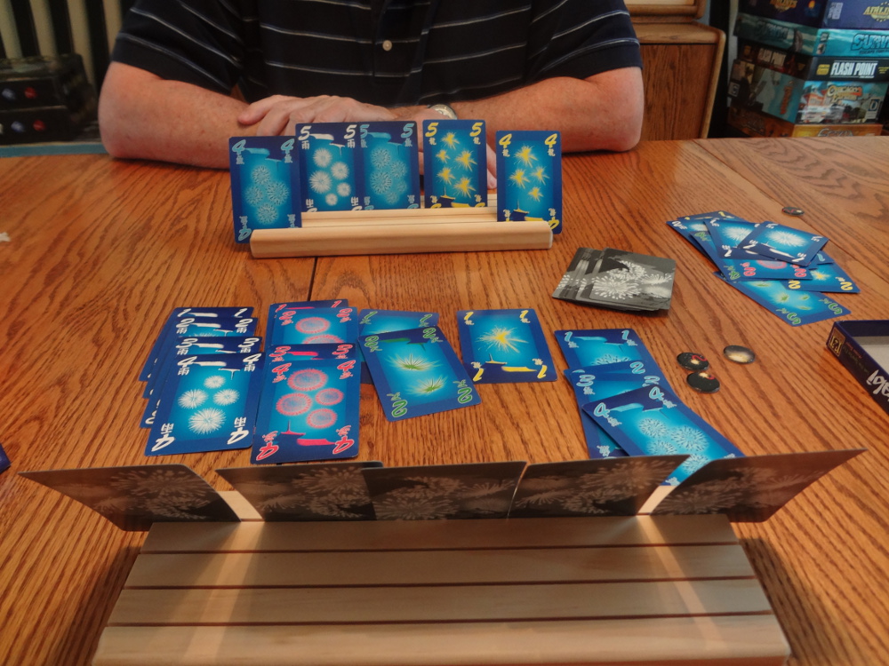 Game of Hanabi played using wooden Card-Boards card holders