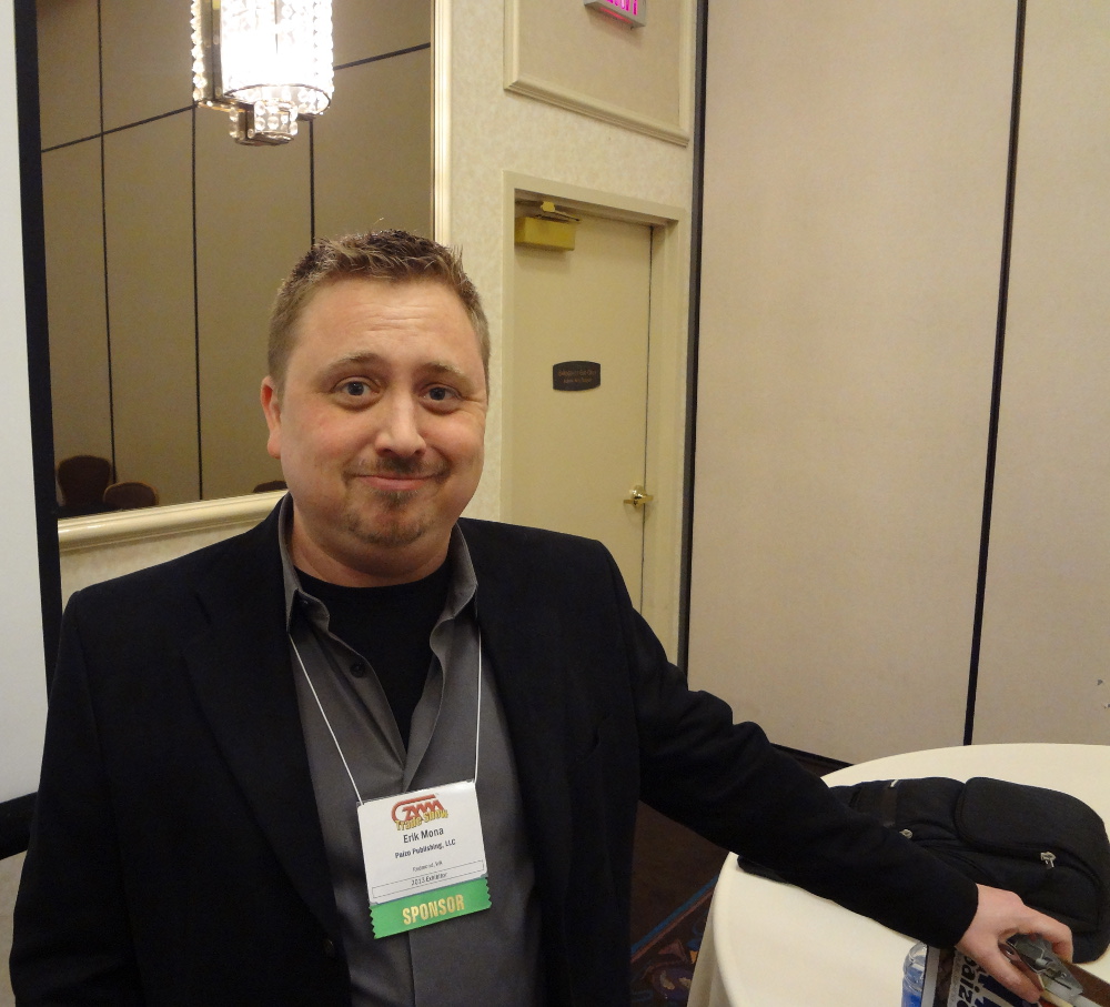 Paizo Publisher Erik Mona with pleased expression at GAMA Trade Show